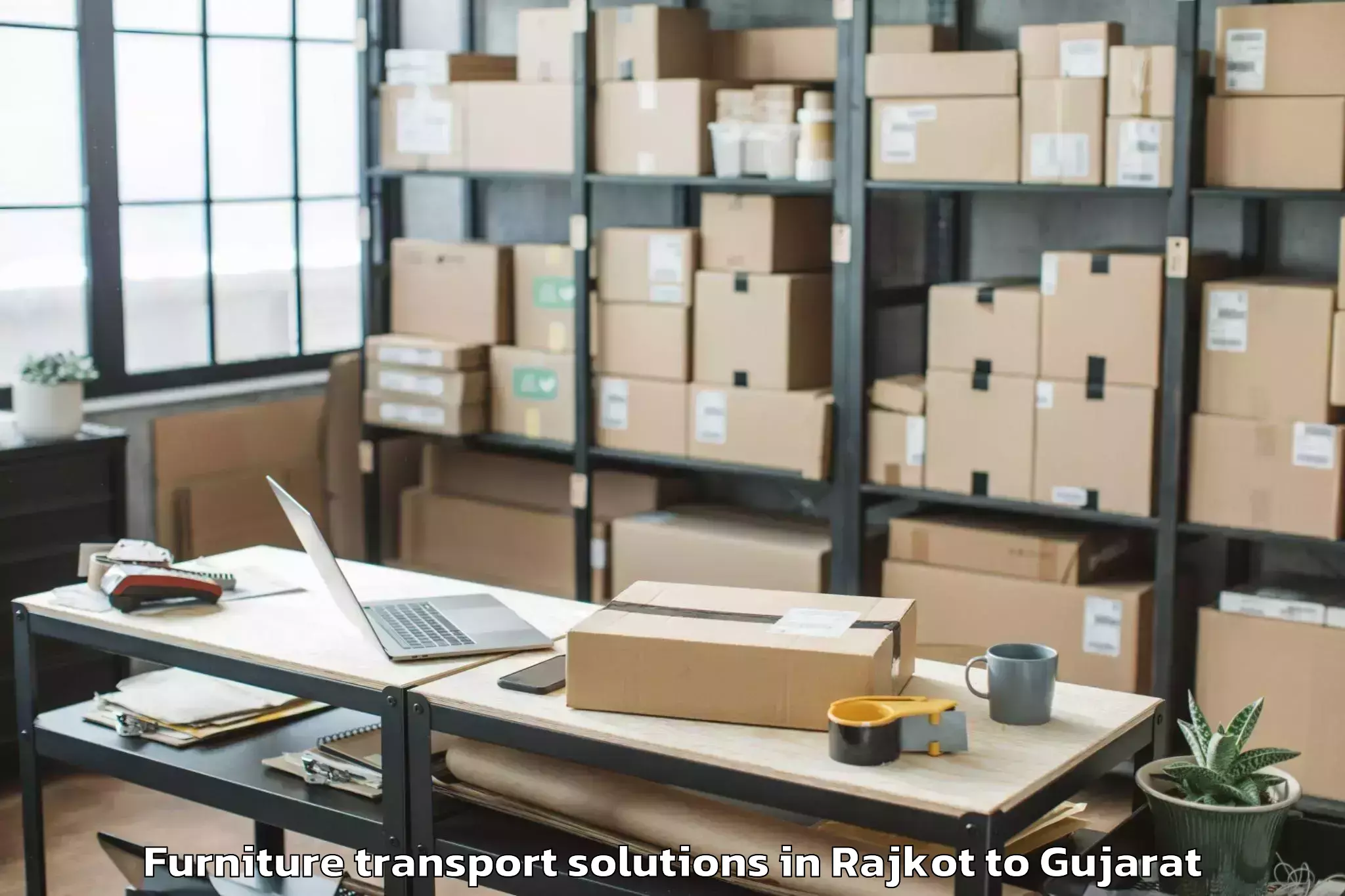 Book Rajkot to Kamrej Furniture Transport Solutions Online